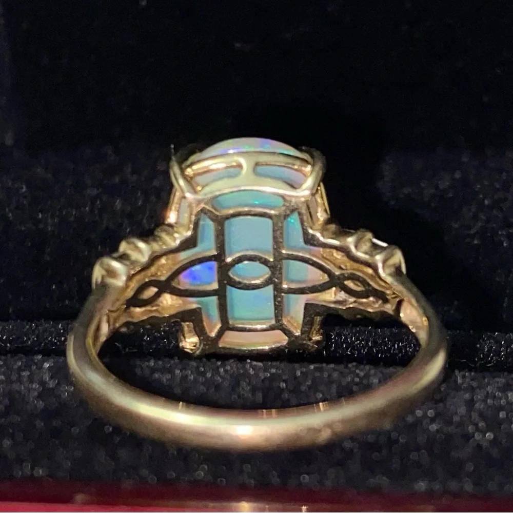 AAA Ethiopian Welo 7.56 cwt Opal and G-H SI Diamond Ring in 10 k gold size 7